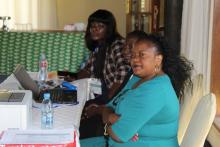 ACEDHA Project Manager, Mrs. Marjorie Equamo Phiri following proceedings during the ISAB meeting